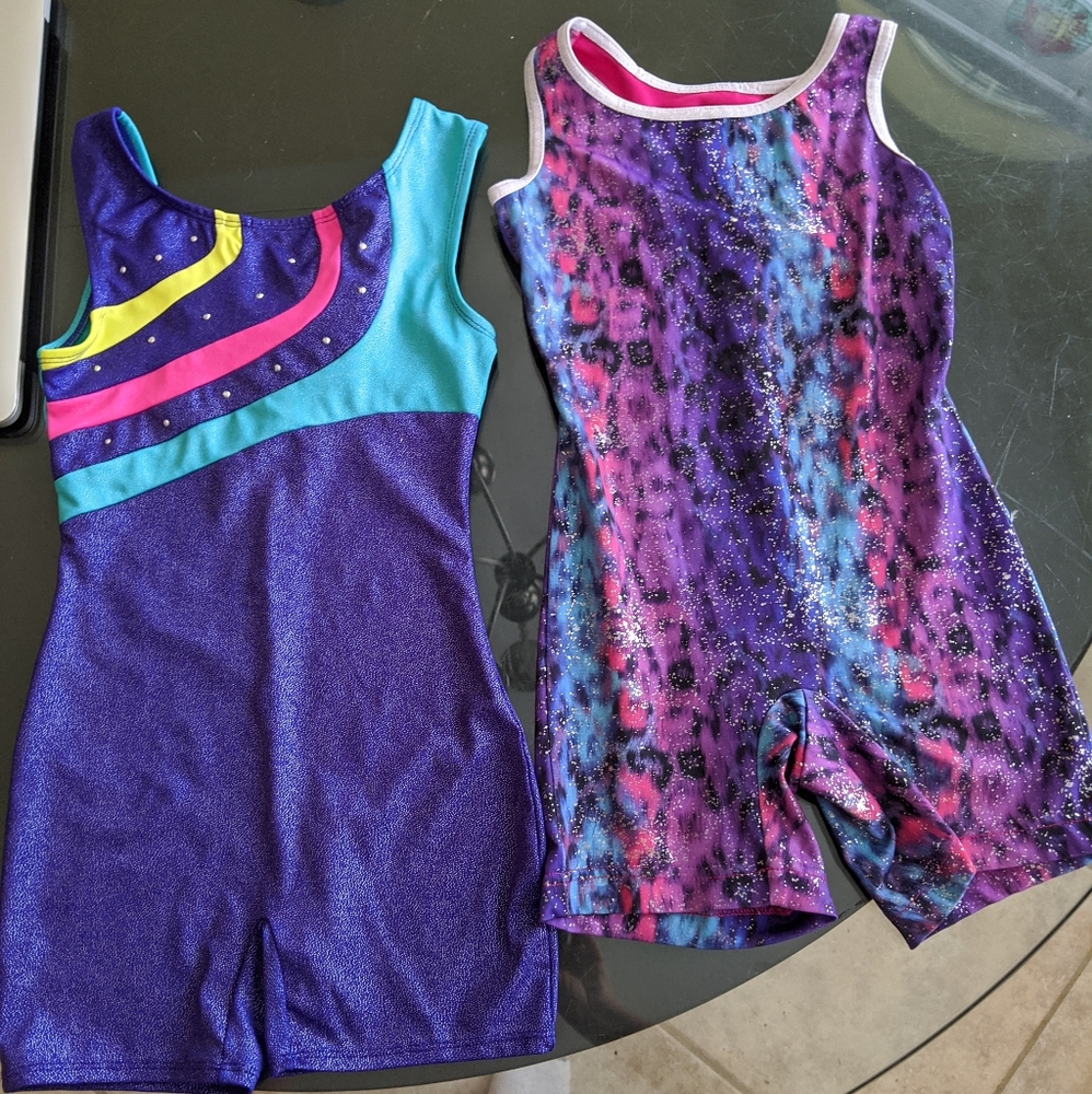 3 girls gymnastics biketards
